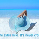 Go the extra mile. It's ever crowded. Girl with blue floppy hat on the beach